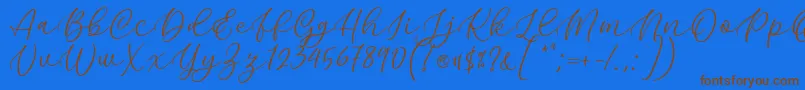 Шрифт Kelidya Font by Keithzo 7NTypes – коричневые шрифты на синем фоне