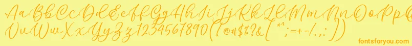 Kelidya Font by Keithzo 7NTypes Font – Orange Fonts on Yellow Background