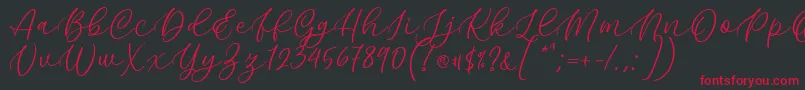 フォントKelidya Font by Keithzo 7NTypes – 黒い背景に赤い文字