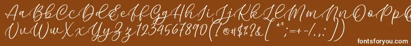 Kelidya Font by Keithzo 7NTypes-fontti – valkoiset fontit ruskealla taustalla