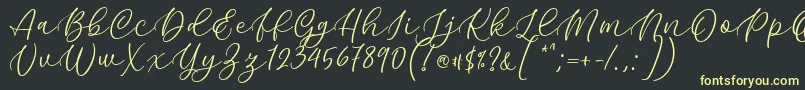 Kelidya Font by Keithzo 7NTypes Font – Yellow Fonts on Black Background