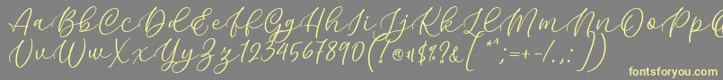 Шрифт Kelidya Font by Keithzo 7NTypes – жёлтые шрифты на сером фоне