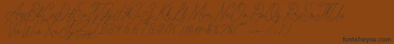 Kelony Font – Black Fonts on Brown Background