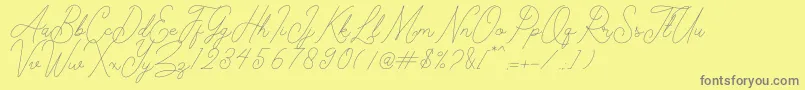 Kelony Font – Gray Fonts on Yellow Background