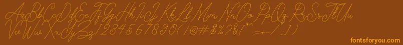 Kelony Font – Orange Fonts on Brown Background