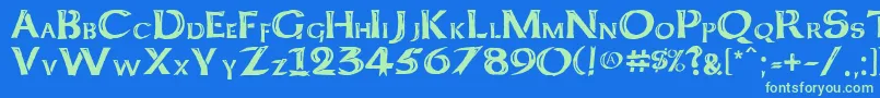 Kelt Caps Freehand Font – Green Fonts on Blue Background