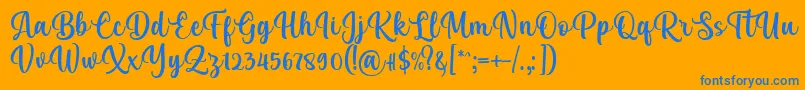 Kelya Font by 7NTypes Font – Blue Fonts on Orange Background