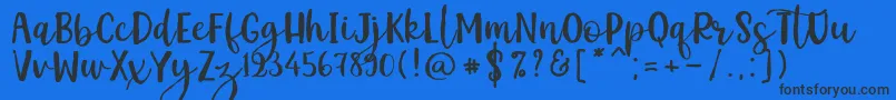 Kemistale Regular Font – Black Fonts on Blue Background