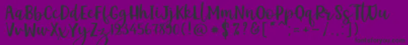 Kemistale Regular Font – Black Fonts on Purple Background