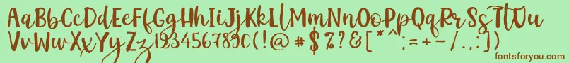 Kemistale Regular Font – Brown Fonts on Green Background