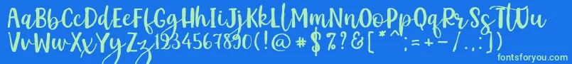 Kemistale Regular Font – Green Fonts on Blue Background