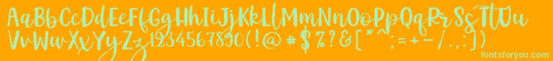 Kemistale Regular Font – Green Fonts on Orange Background