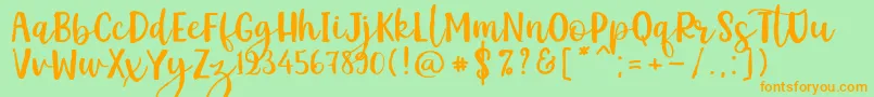 Kemistale Regular Font – Orange Fonts on Green Background