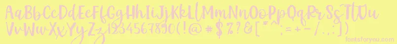 フォントKemistale Regular – ピンクのフォント、黄色の背景