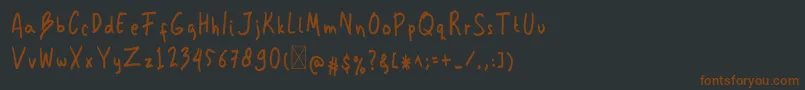 Kemplu-fontti – ruskeat fontit mustalla taustalla