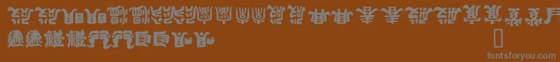 KEMURI  -Schriftart – Graue Schriften auf braunem Hintergrund