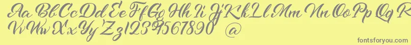 Kenshington-Schriftart – Graue Schriften auf gelbem Hintergrund