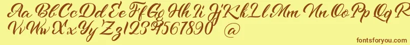 Kenshington Font – Brown Fonts on Yellow Background