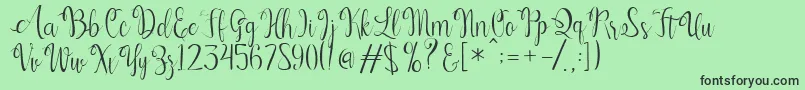 フォントKerling Script – 緑の背景に黒い文字