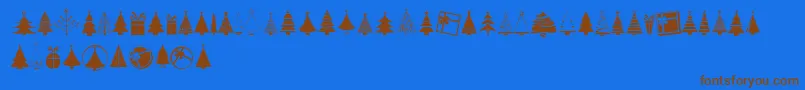 KGChristmasTrees-Schriftart – Braune Schriften auf blauem Hintergrund