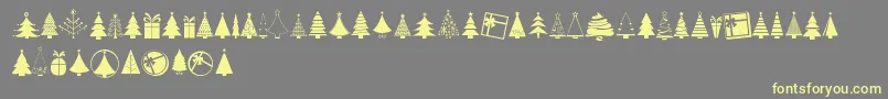 KGChristmasTreesフォントについての詳細 フォントKGChristmasTrees – 黄色のフォント、灰色の背景
