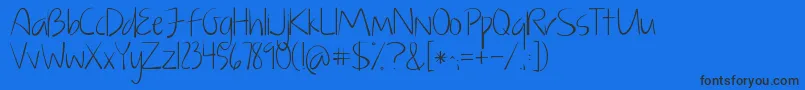 KGJustGiveMeAReason-Schriftart – Schwarze Schriften auf blauem Hintergrund
