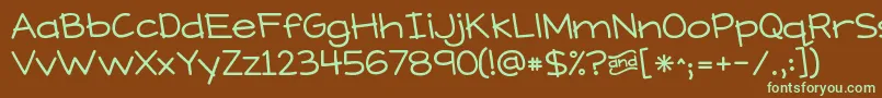 フォントKGWhatDoesTheFoxSay – 緑色の文字が茶色の背景にあります。