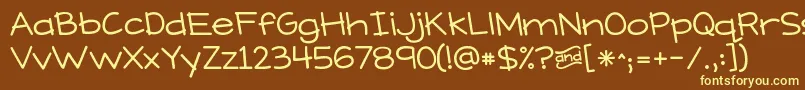 KGWhatDoesTheFoxSay-fontti – keltaiset fontit ruskealla taustalla