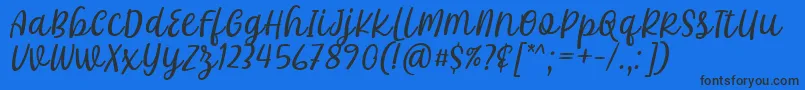 Khalifa Font by 7Ntypes D-Schriftart – Schwarze Schriften auf blauem Hintergrund