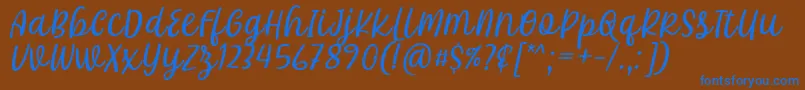 Khalifa Font by 7Ntypes D Font – Blue Fonts on Brown Background