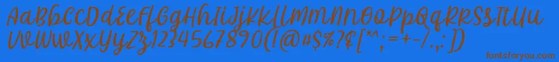 fuente Khalifa Font by 7Ntypes D – Fuentes Marrones Sobre Fondo Azul