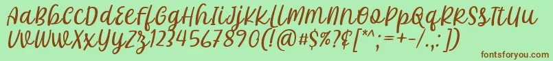 Шрифт Khalifa Font by 7Ntypes D – коричневые шрифты на зелёном фоне