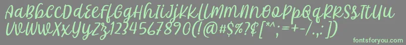 Czcionka Khalifa Font by 7Ntypes D – zielone czcionki na szarym tle