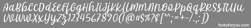 Khalifa Font by 7Ntypes D-fontti – valkoiset fontit harmaalla taustalla