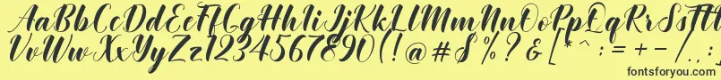 Khinta Script Font – Black Fonts on Yellow Background