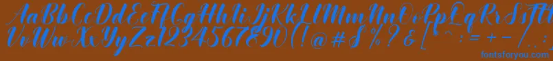 Khinta Script Font – Blue Fonts on Brown Background