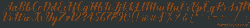 Khinta Script Font – Brown Fonts on Black Background