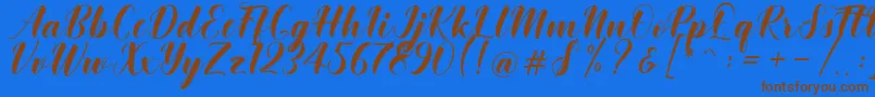 Khinta Script Font – Brown Fonts on Blue Background