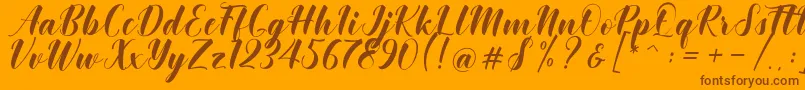 Khinta Script Font – Brown Fonts on Orange Background