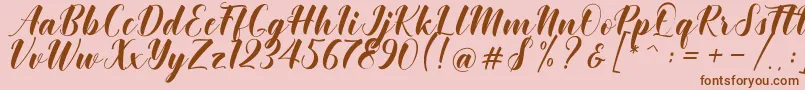 Khinta Script Font – Brown Fonts on Pink Background