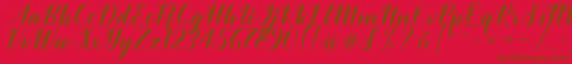 Khinta Script Font – Brown Fonts on Red Background