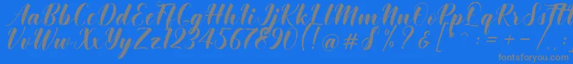 Khinta Script Font – Gray Fonts on Blue Background