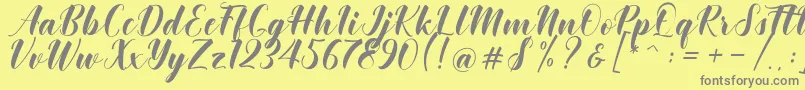 Khinta Script Font – Gray Fonts on Yellow Background