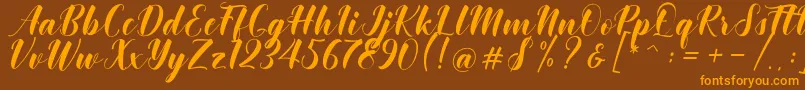 Khinta Script Font – Orange Fonts on Brown Background