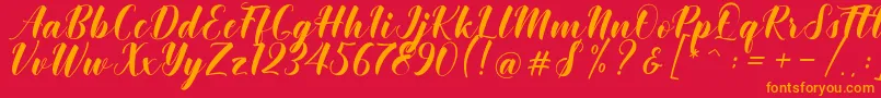 Khinta Script Font – Orange Fonts on Red Background