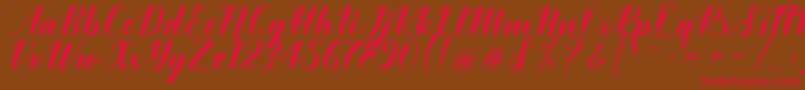 Khinta Script Font – Red Fonts on Brown Background