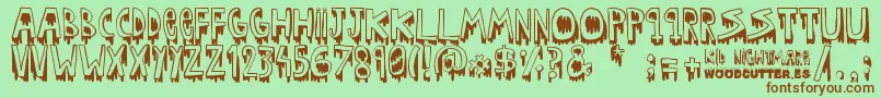 Kid nightmare-Schriftart – Braune Schriften auf grünem Hintergrund