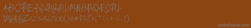 Kid Roughフォントについての詳細 フォントKid Rough – 茶色の背景に灰色の文字