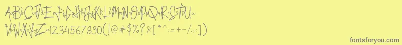 Fonte Kid Rough – fontes cinzas em um fundo amarelo