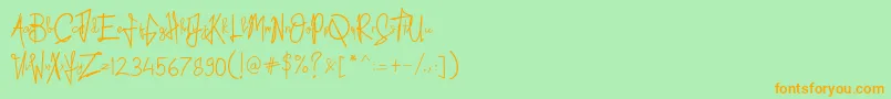 フォントKid Rough – オレンジの文字が緑の背景にあります。
